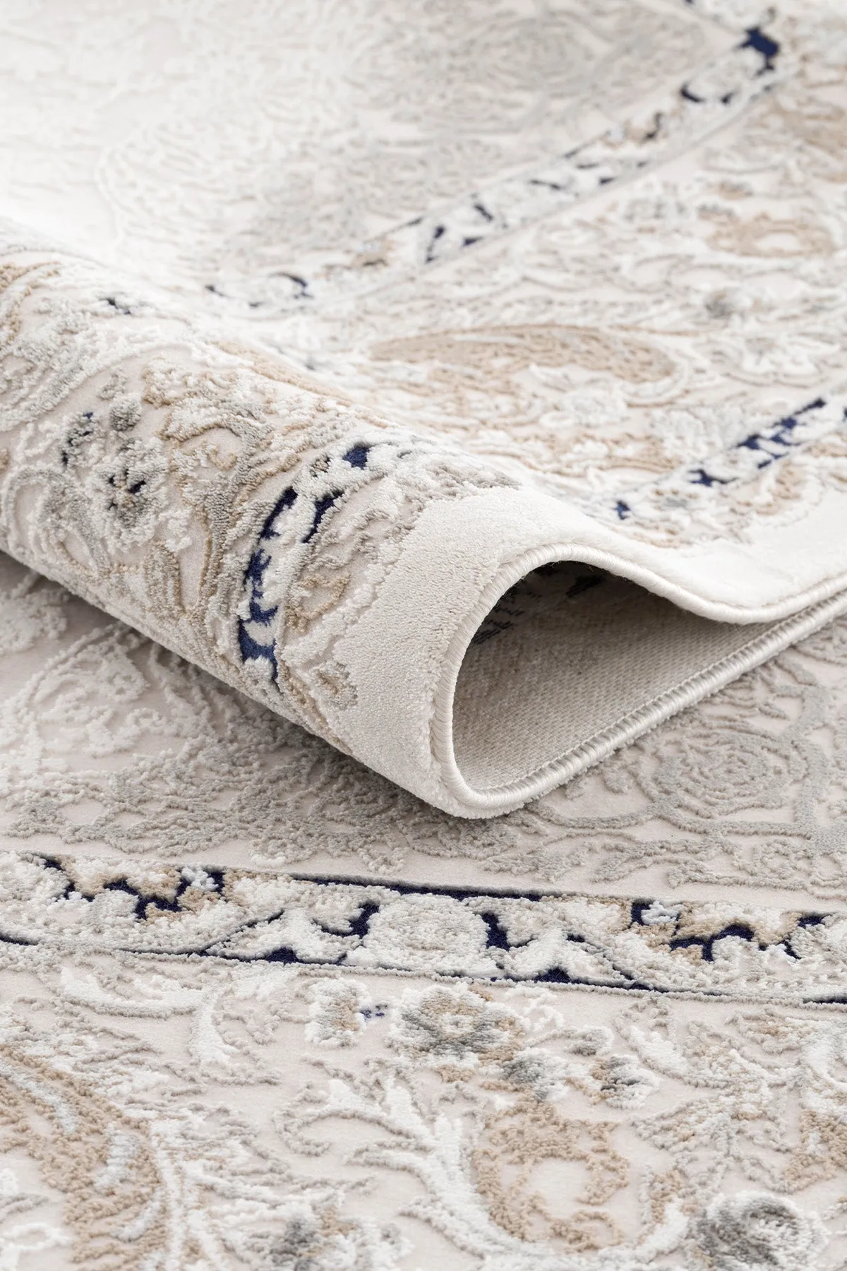 Koza Mirage Cremeblauer Wohnzimmerteppich