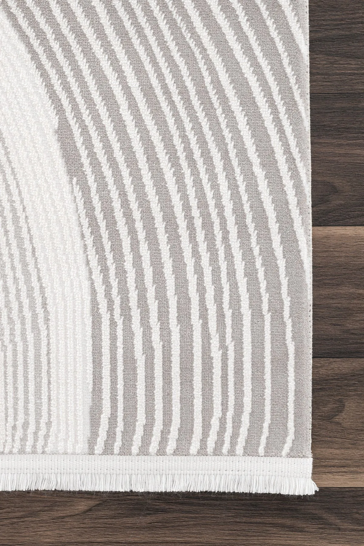 Beige gestreifter Teppich